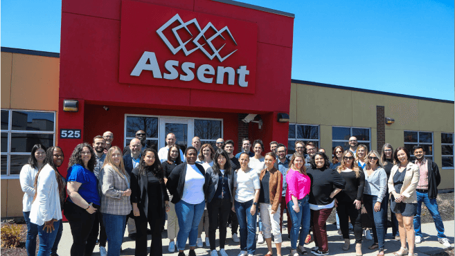 Assent team in front their office.
