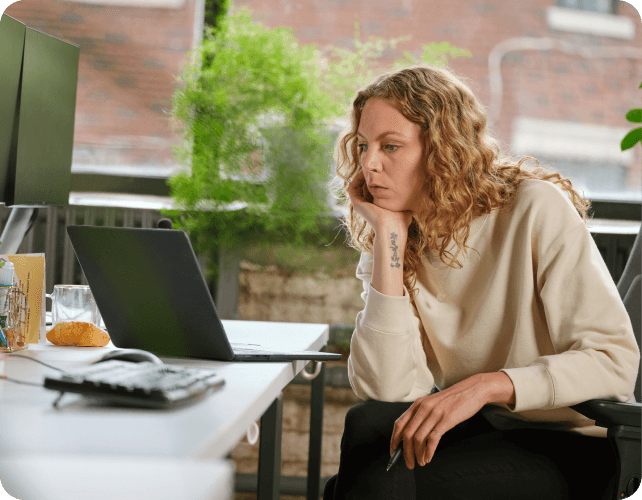 Woman watching a webinar on computer
